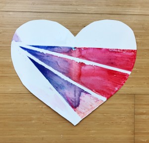 Blue and red watercolor heart with tape